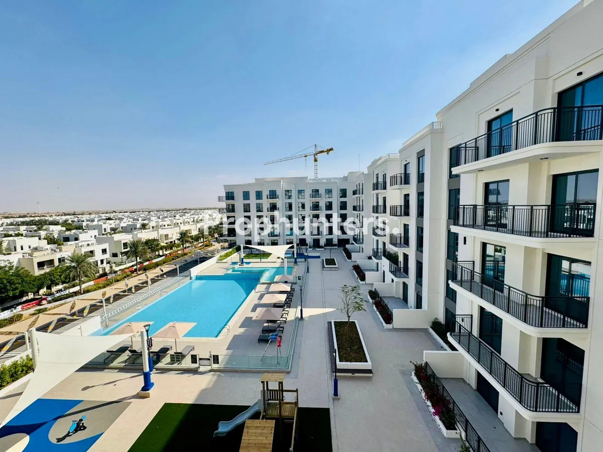 Modern 2BR Apartment | Pool View | Balcony – in The Diplomat Residences